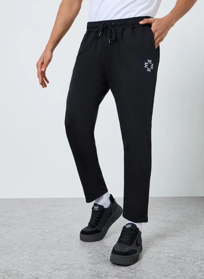 Styli Men Slim Fit Minimal Embroidery Joggers